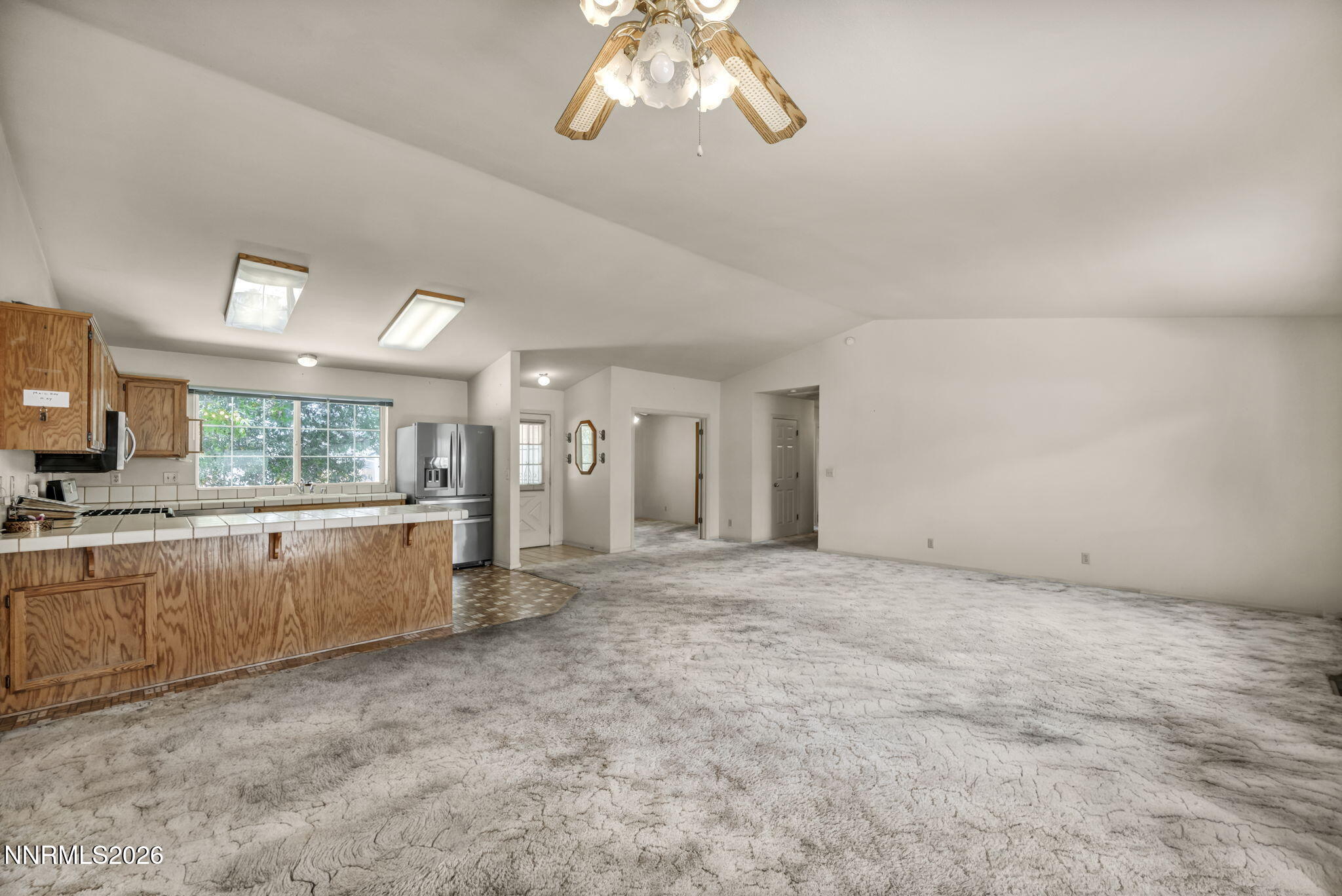 692 Lassen Way Gardnerville, NV 89460 - Photo 5 of 34 a view of a kitchen with a sink and window
