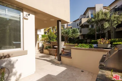 a view of a house with a patio