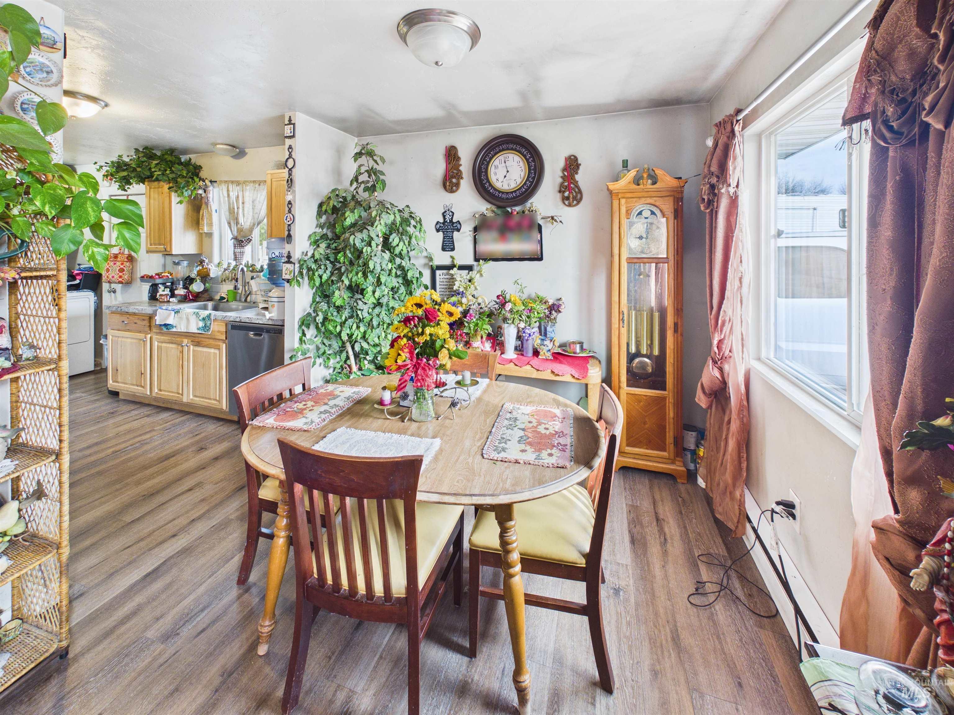 1618 Gingko Street, Unit 3 Rupert, ID 83350 - Photo 11 of 14 Dining room with dark wood-style flooring