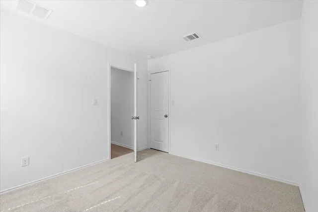 a white bath tub with a shower