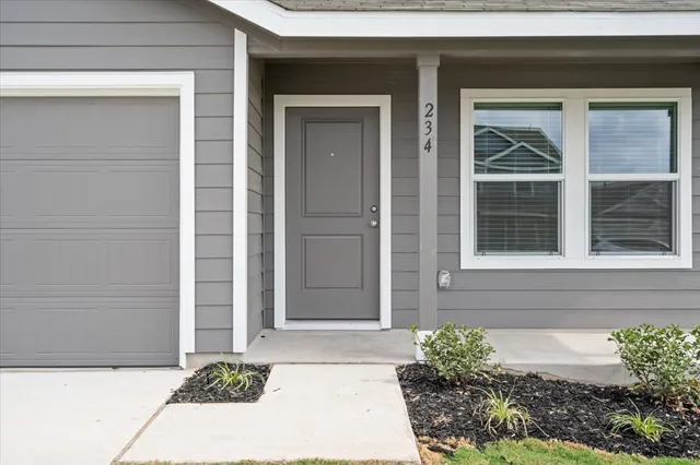 a front view of house with yard