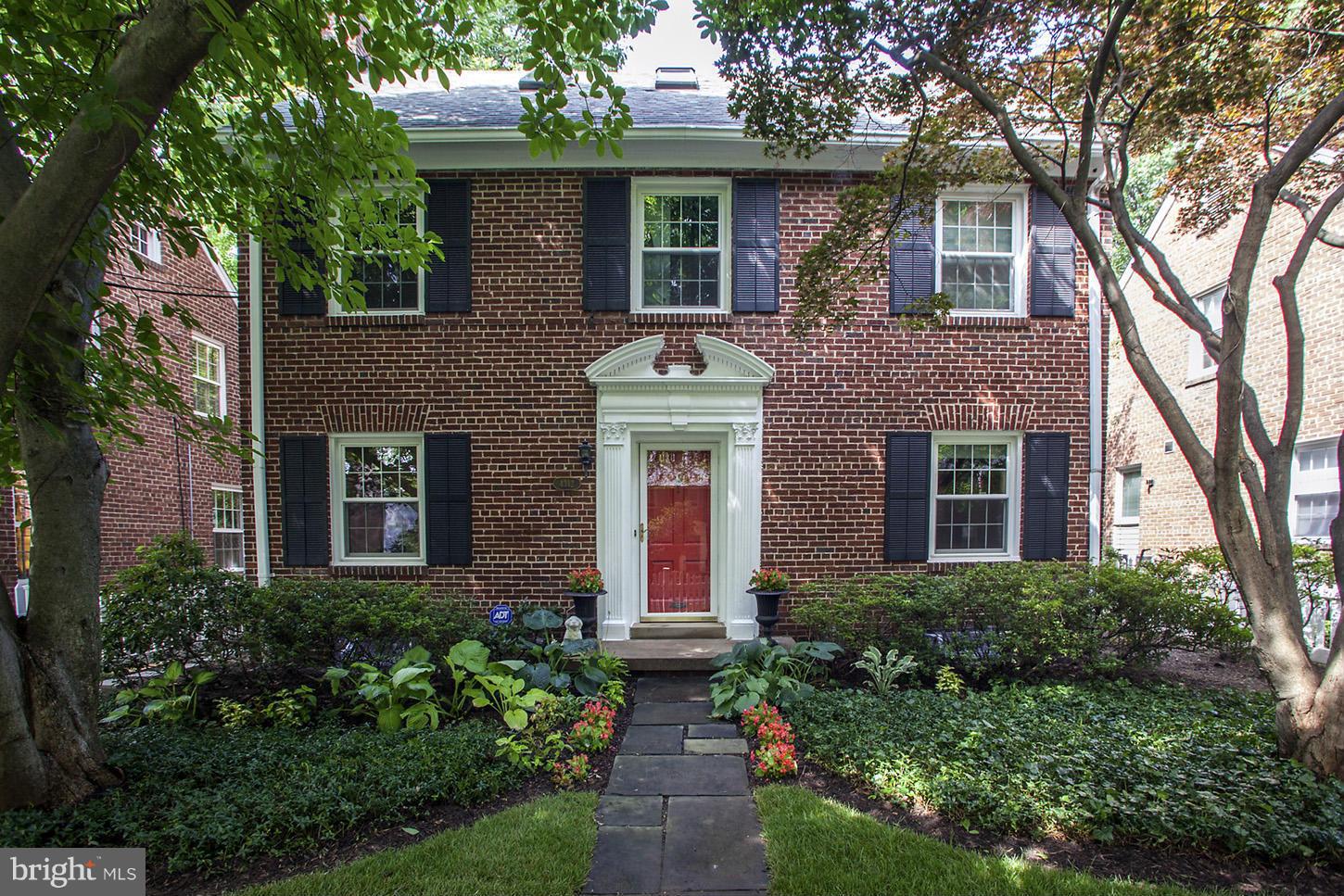 4312 Reno Road Northwest Washington, DC 20008 - Photo 1 of 29 front view of house with a small yard