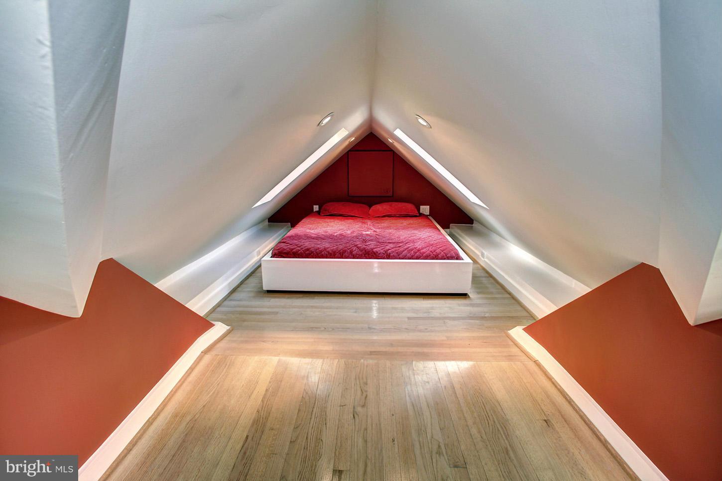 4312 Reno Road Northwest Washington, DC 20008 - Photo 21 of 29 a view of a bedroom with wooden floor and bedroom