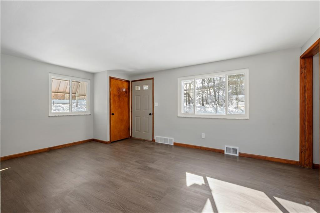 678 Colonial Manor Road Irwin, PA 15642 - Photo 2 of 30 a view of an empty room with a window