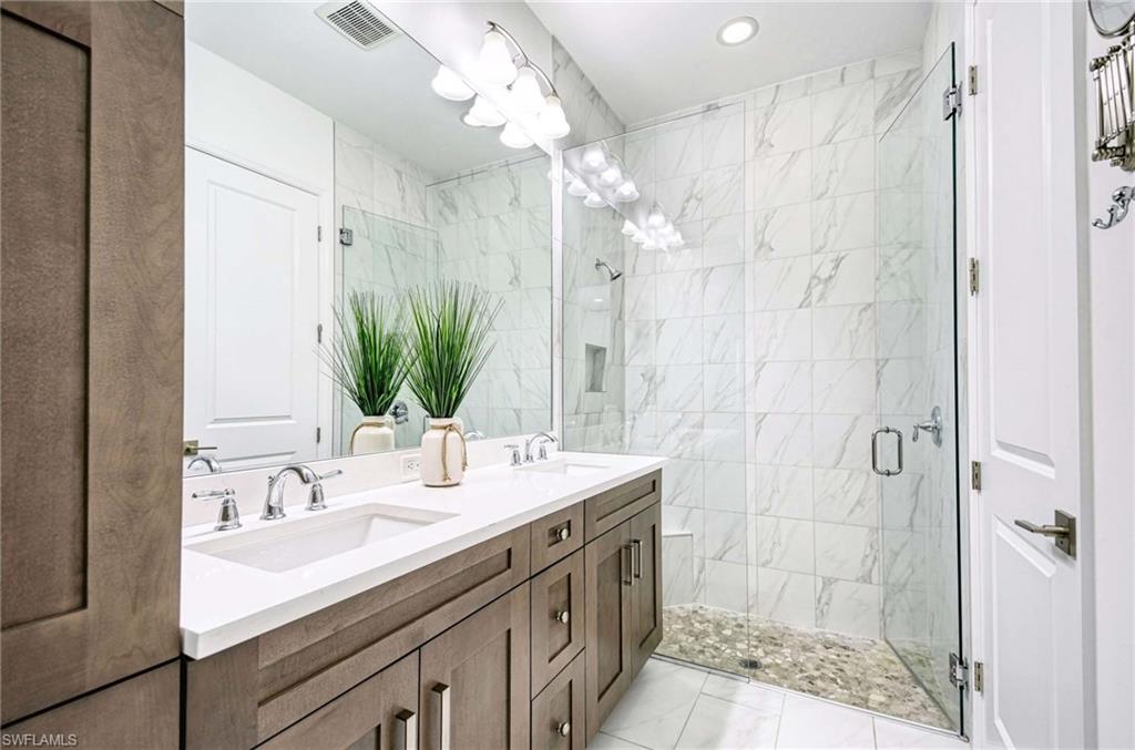 6984 Saona Court Naples, FL 34113 - Photo 16 of 47 MASTER BATHROOM