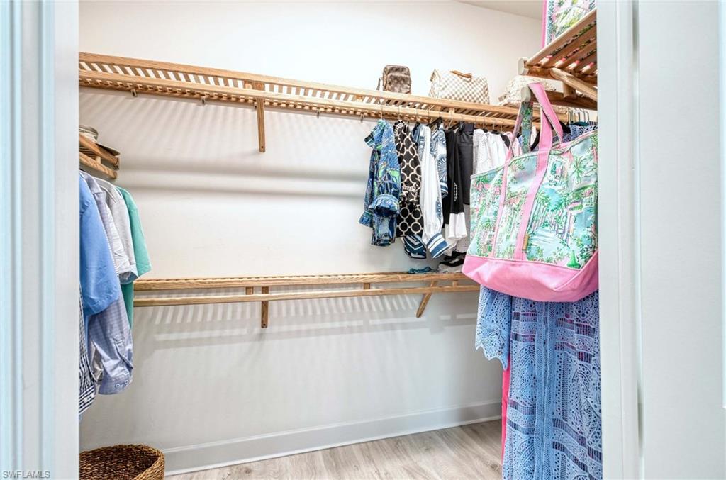 6984 Saona Court Naples, FL 34113 - Photo 18 of 47 MASTER WALK-IN CLOSET