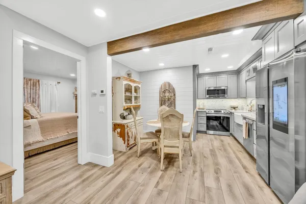 a living room with furniture and a table