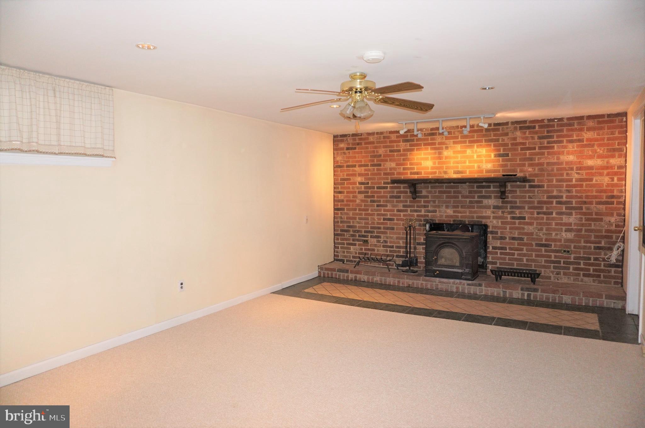 604 South Brownleaf Road Newark, DE 19713 - Photo 19 of 24 fireplace with wood burning stove