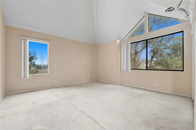 an empty room with windows