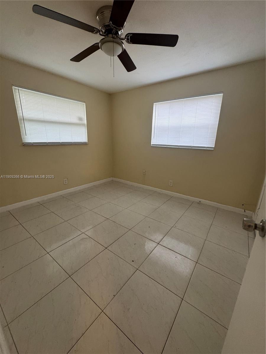 5700 Northwest 15th Street, Unit 2 Lauderhill, FL 33313 - Photo 6 of 7 a view of an empty room