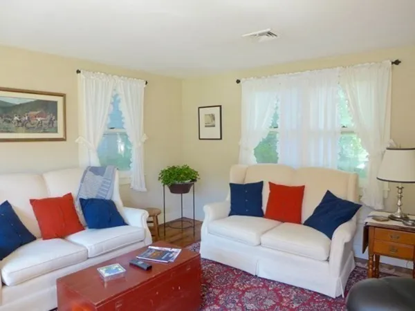 a living room with furniture and a couch