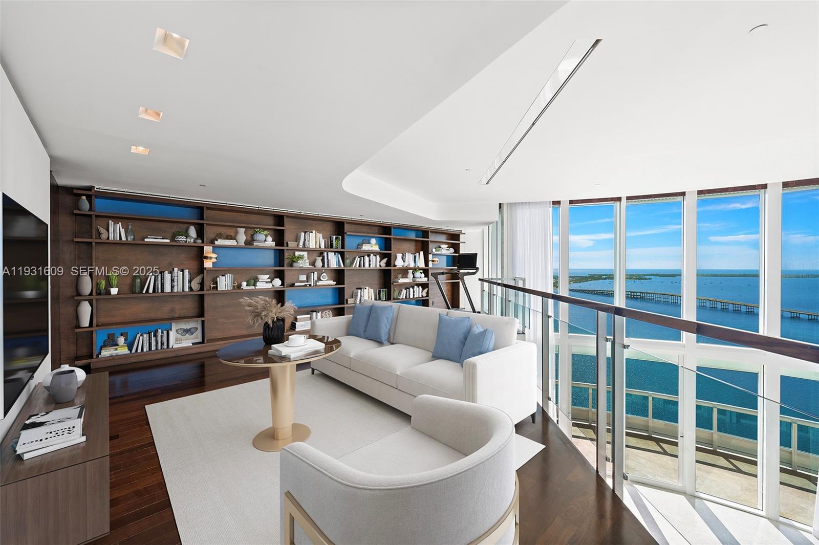 1643 Brickell Avenue, Unit 4102 Miami, FL 33129 - Photo 29 of 49 Family Room with custom wall unit on upper level