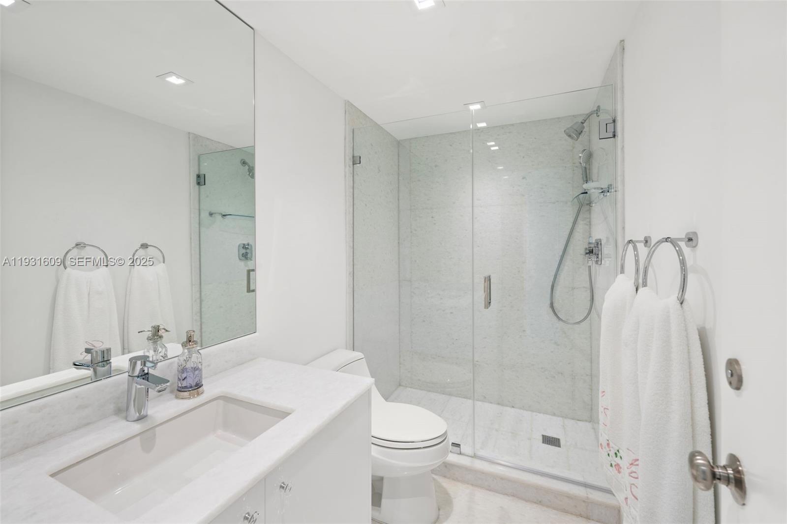 1643 Brickell Avenue, Unit 4102 Miami, FL 33129 - Photo 38 of 49 Guest bathroom adjacent to Family Room