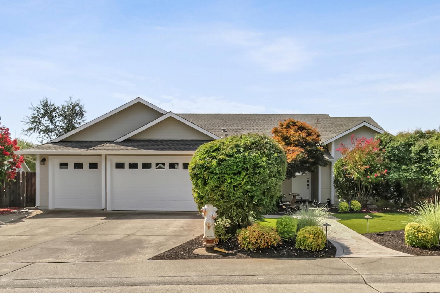 5555 Tudor Way Loomis, CA 95650 - Photo 1 of 1 front view of a house with a yard