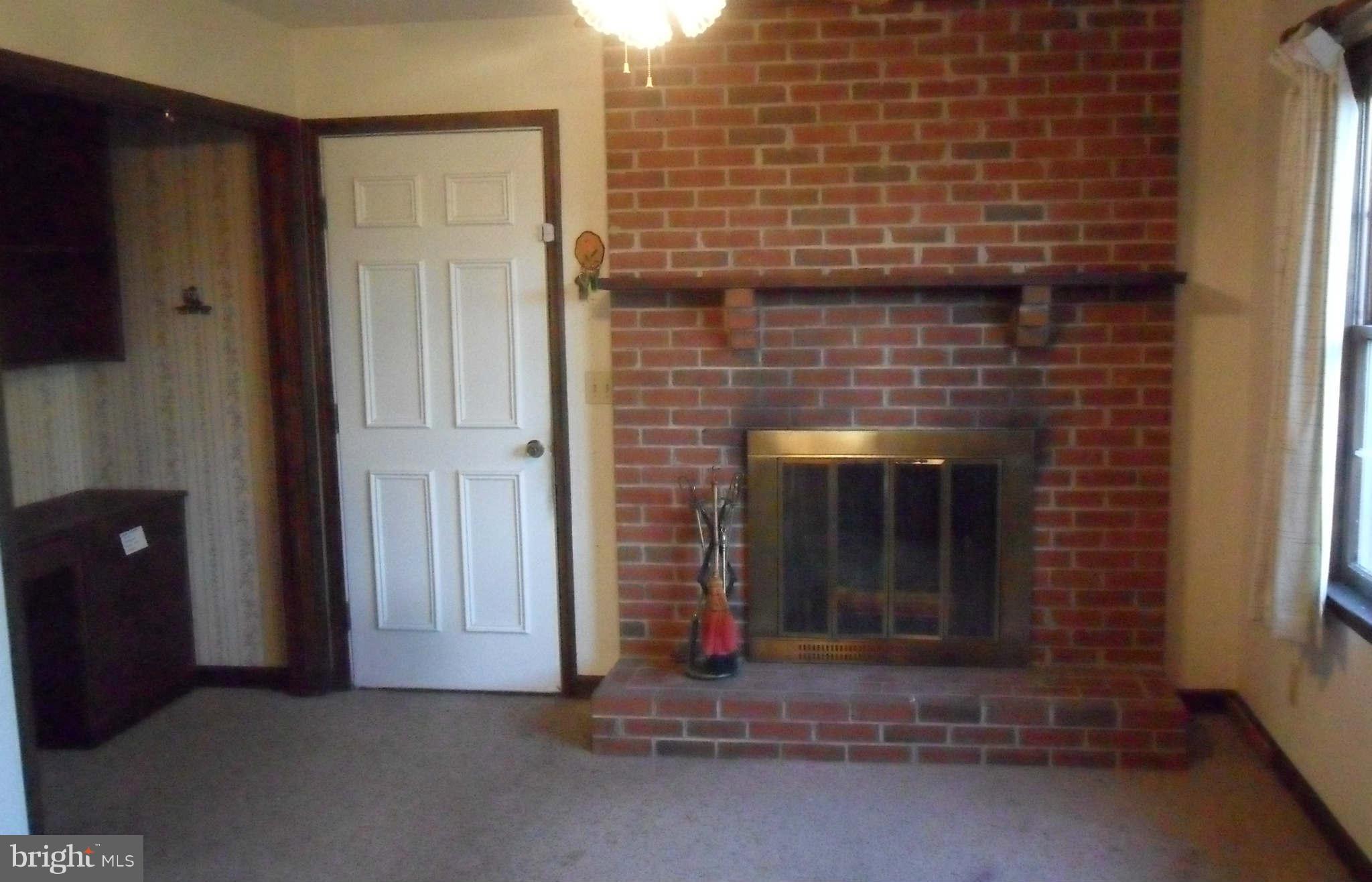 21297 Jacobs Ford Road Lignum, VA 22726 - Photo 11 of 26 Enjoy the cozy woodburning fireplace this Holiday