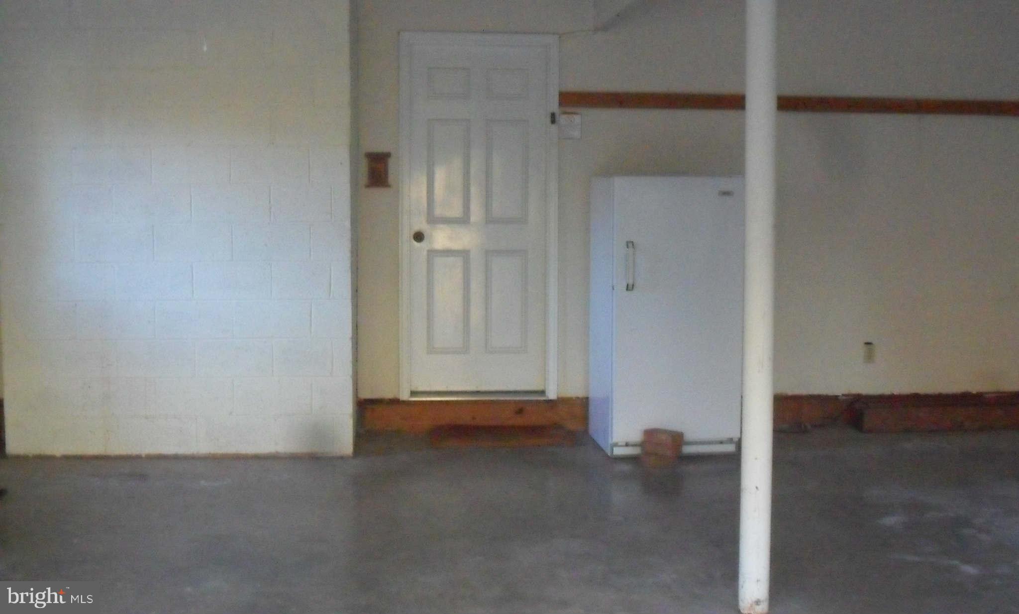21297 Jacobs Ford Road Lignum, VA 22726 - Photo 8 of 26 garage - drywalled and painted and lots of windows