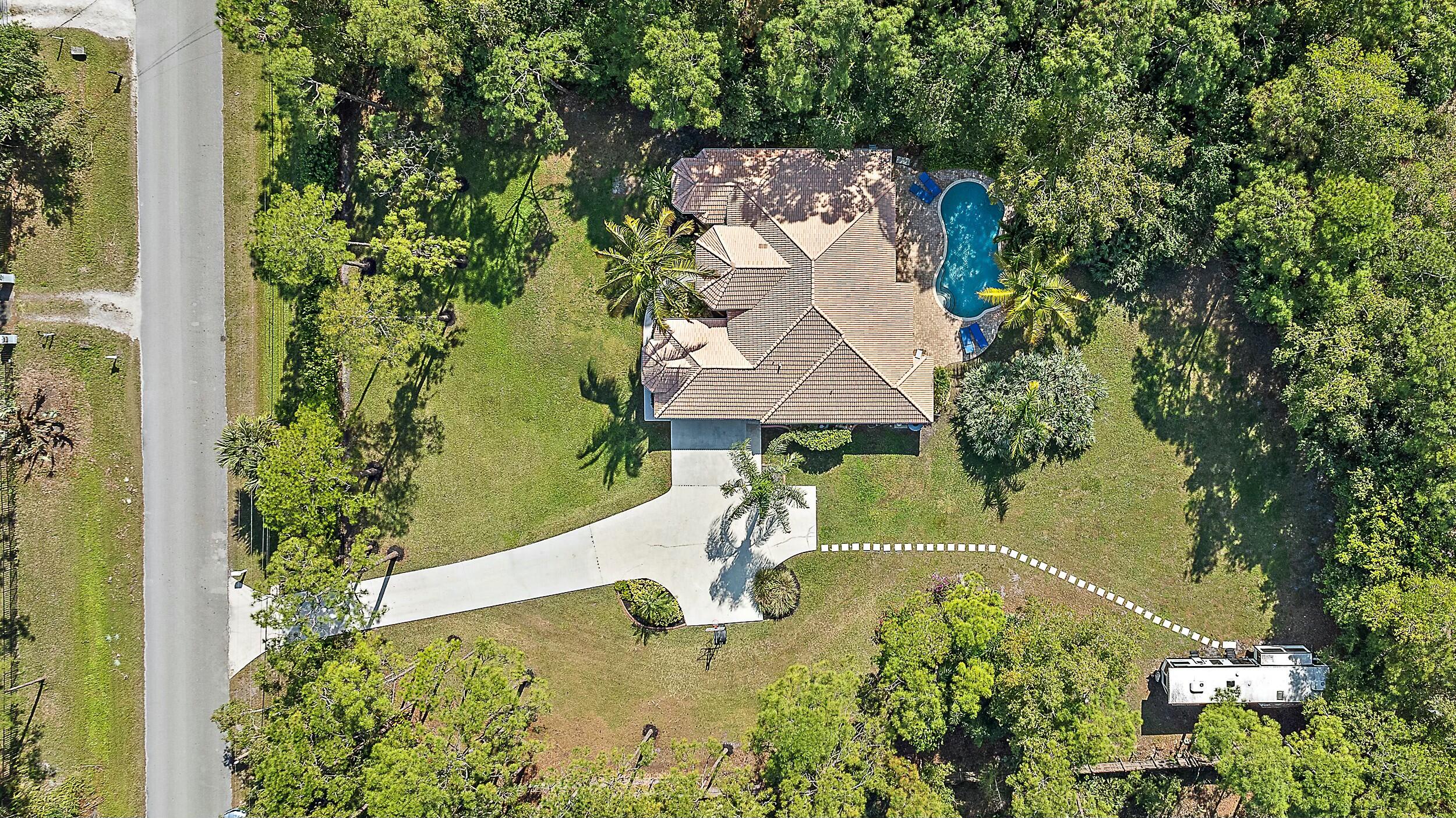 15415 Alexander Run Jupiter, FL 33478 - Photo 11 of 38 Paved Road 1.55 Acres