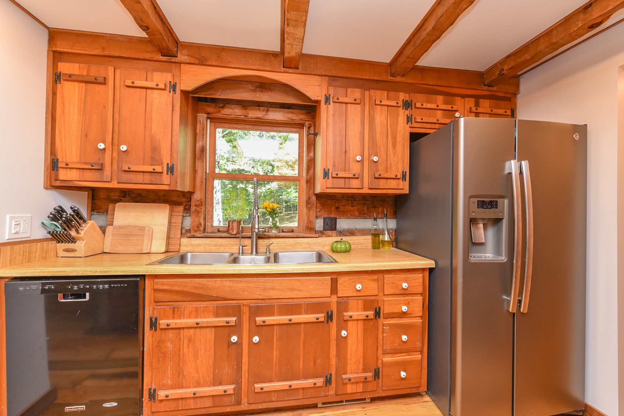 1630 Center Point Road Hendersonville, TN 37075 - Photo 13 of 46 a kitchen with a sink a refrigerator and a window