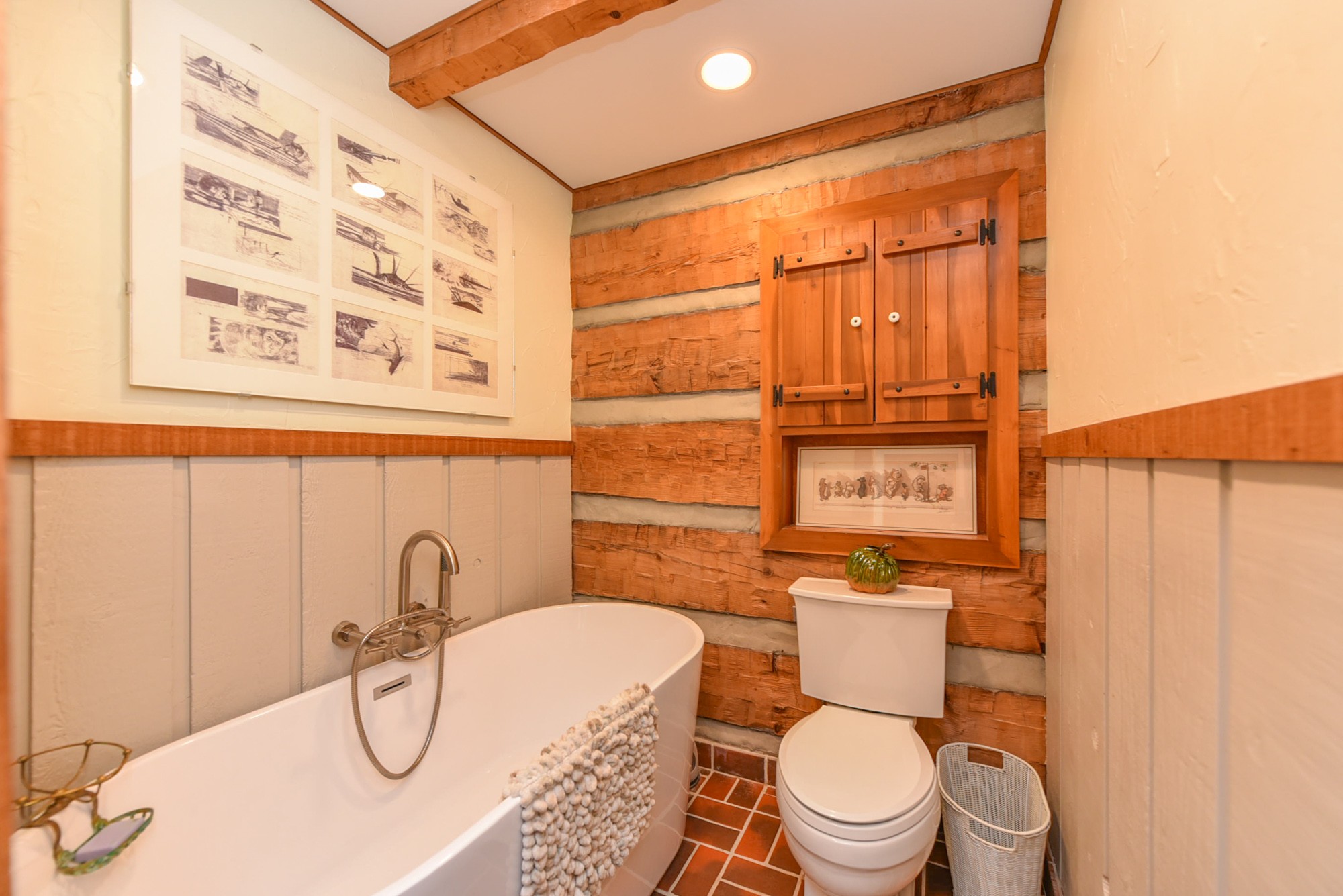 1630 Center Point Road Hendersonville, TN 37075 - Photo 24 of 46 a white toilet sitting next to a bathroom sink and a shower curtain