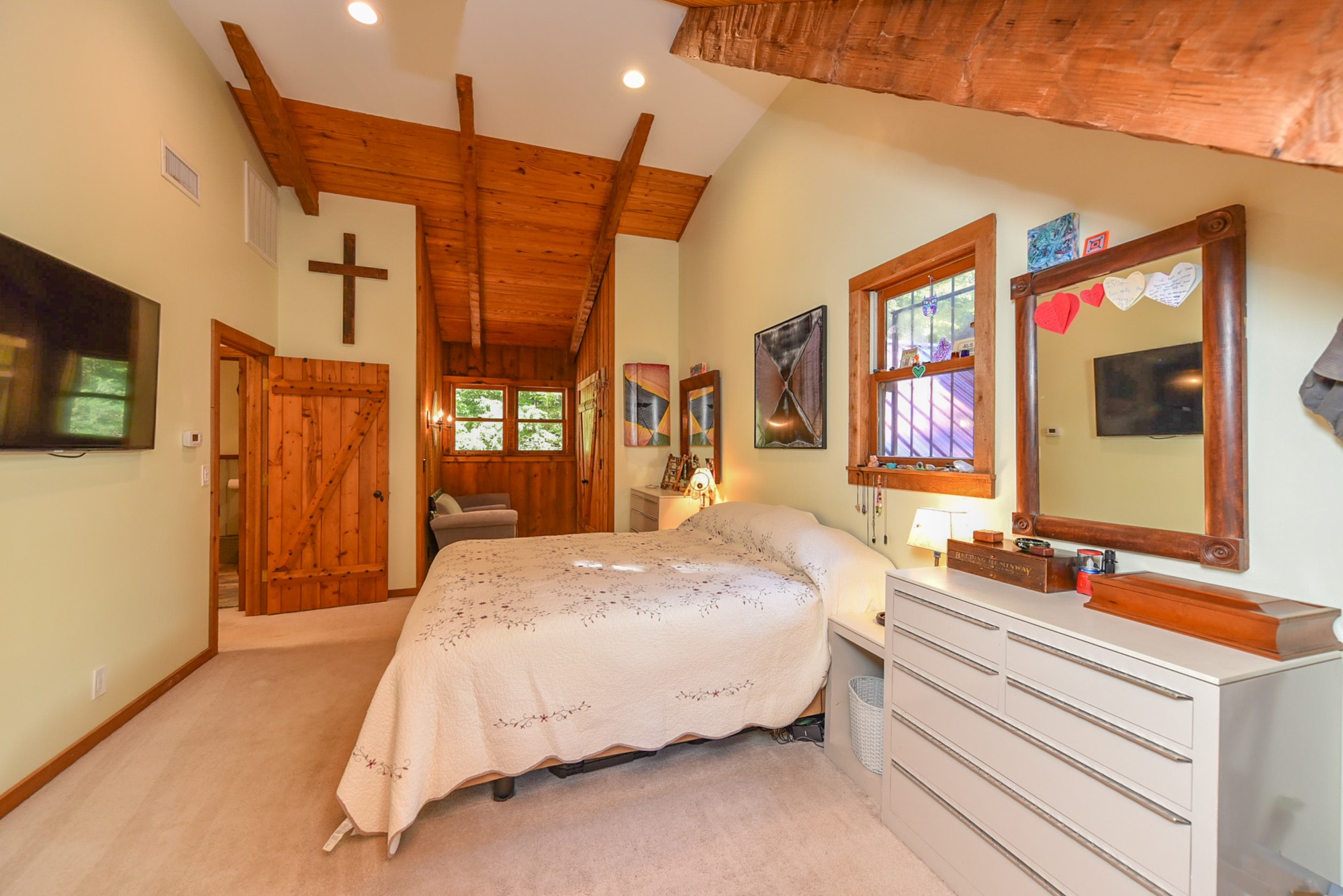 1630 Center Point Road Hendersonville, TN 37075 - Photo 30 of 46 a spacious bedroom with a bed and a flat screen tv