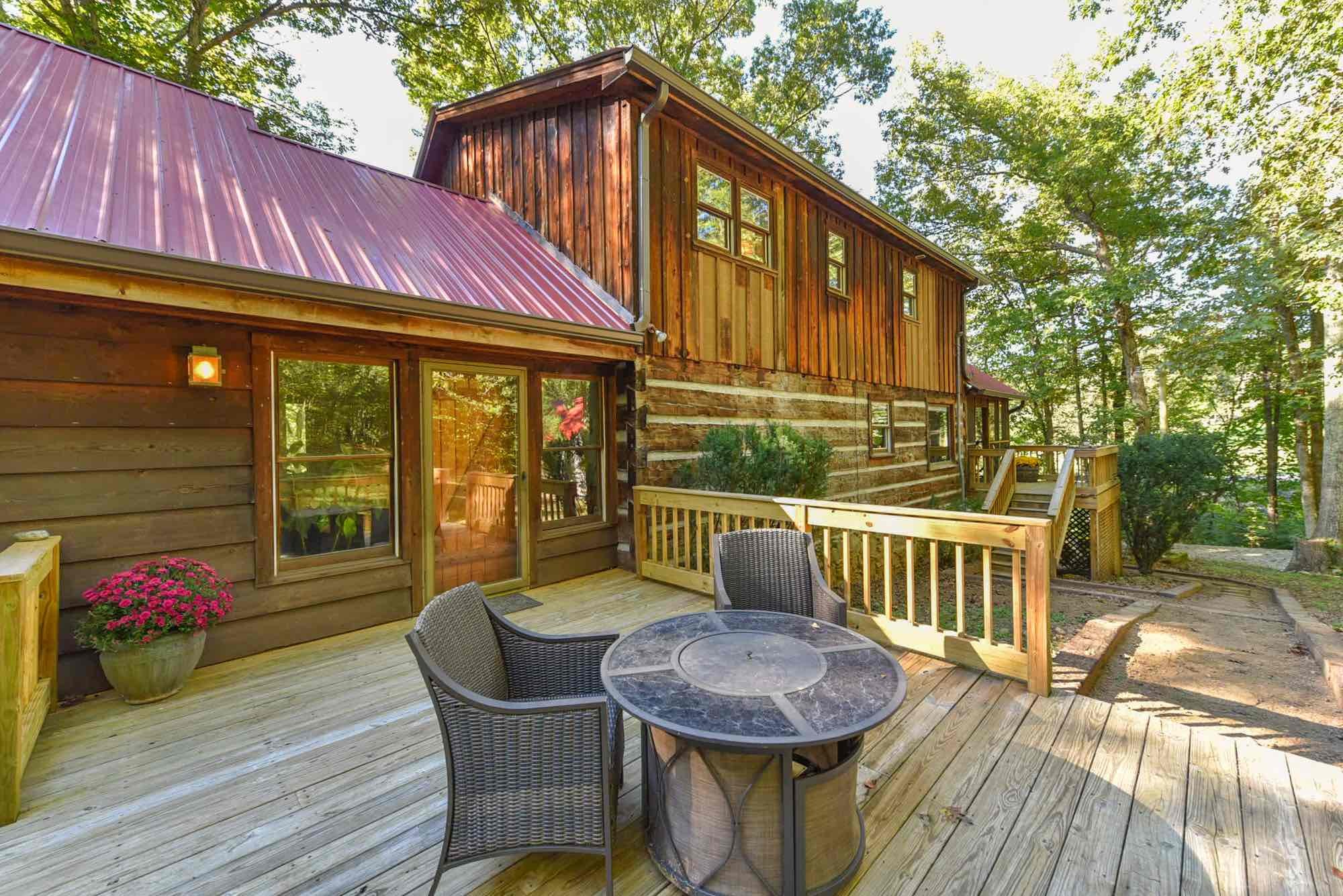1630 Center Point Road Hendersonville, TN 37075 - Photo 4 of 46 a view of a chairs and table on the wooden roof deck