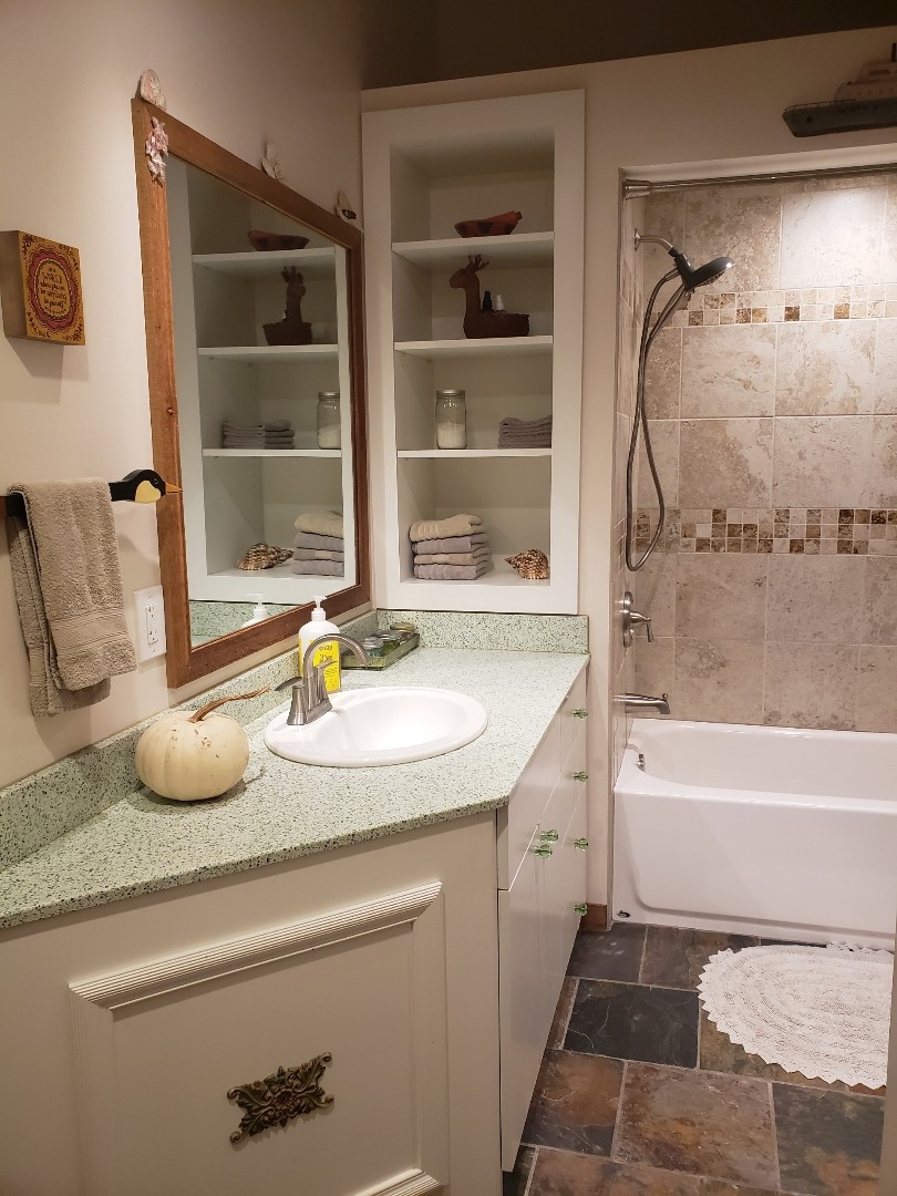 1630 Center Point Road Hendersonville, TN 37075 - Photo 45 of 46 a bathroom with a granite countertop sink and a mirror