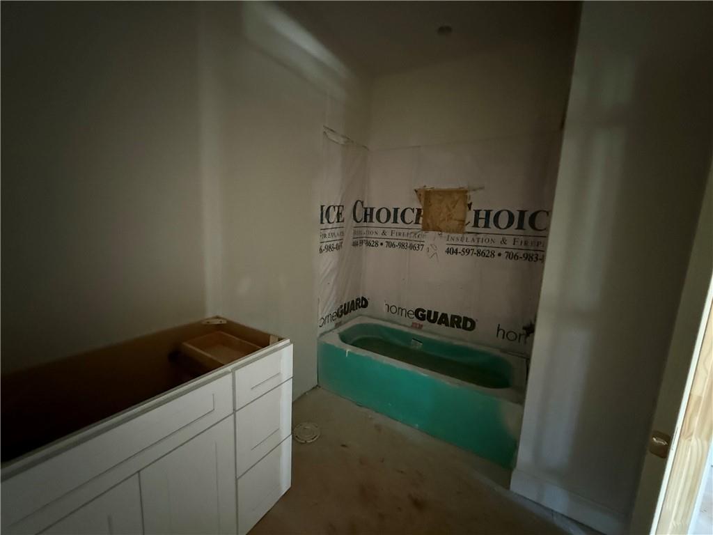 91 Lenten Rose Lane Pendergrass, GA 30567 - Photo 28 of 29 a utility room with dryer and washer