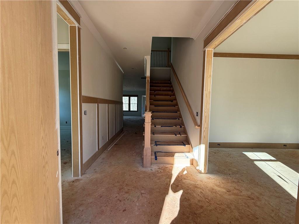 91 Lenten Rose Lane Pendergrass, GA 30567 - Photo 5 of 29 a view of entryway and hall with wooden floor