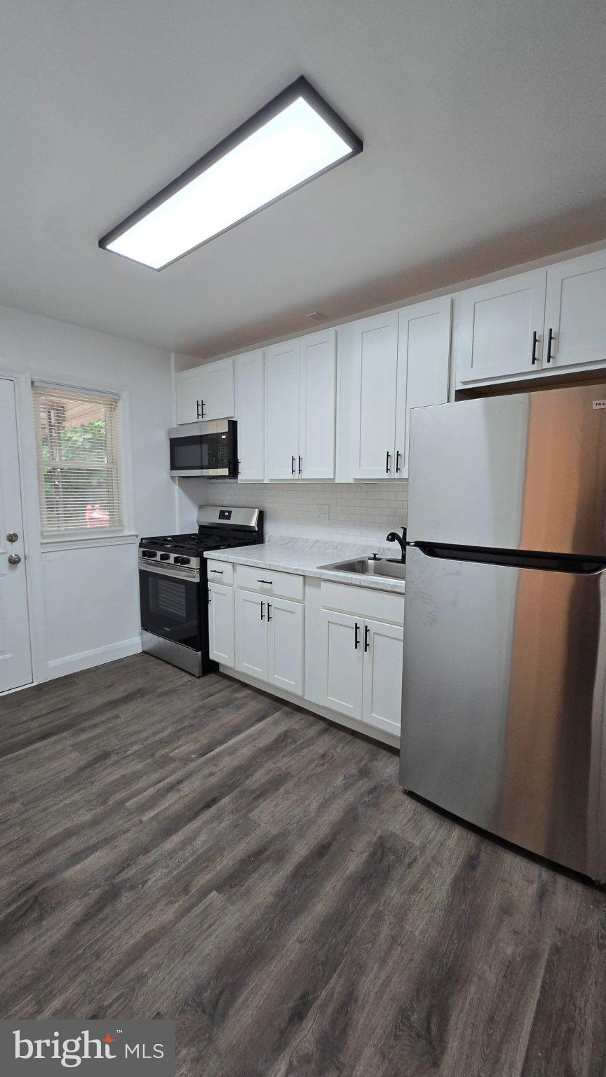 3820 Elkader Road Baltimore, MD 21218 - Photo 5 of 41 Modern kitchen with sleek finishes.