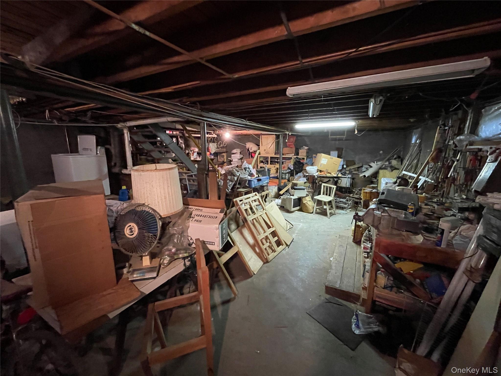 2043 Paddock Road Seaford, NY 11783 - Photo 17 of 25 a view of a room with gym equipment
