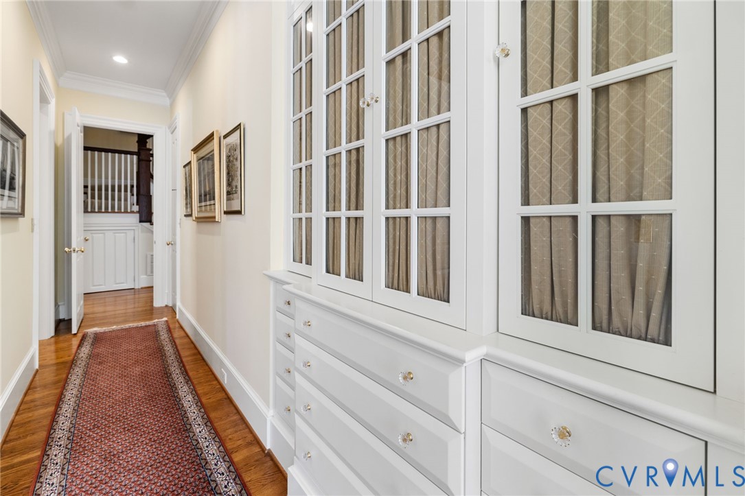 2730 Live Oak Lane Midlothian, VA 23113 - Photo 13 of 31 Hallway to Primary with custom cabinetry