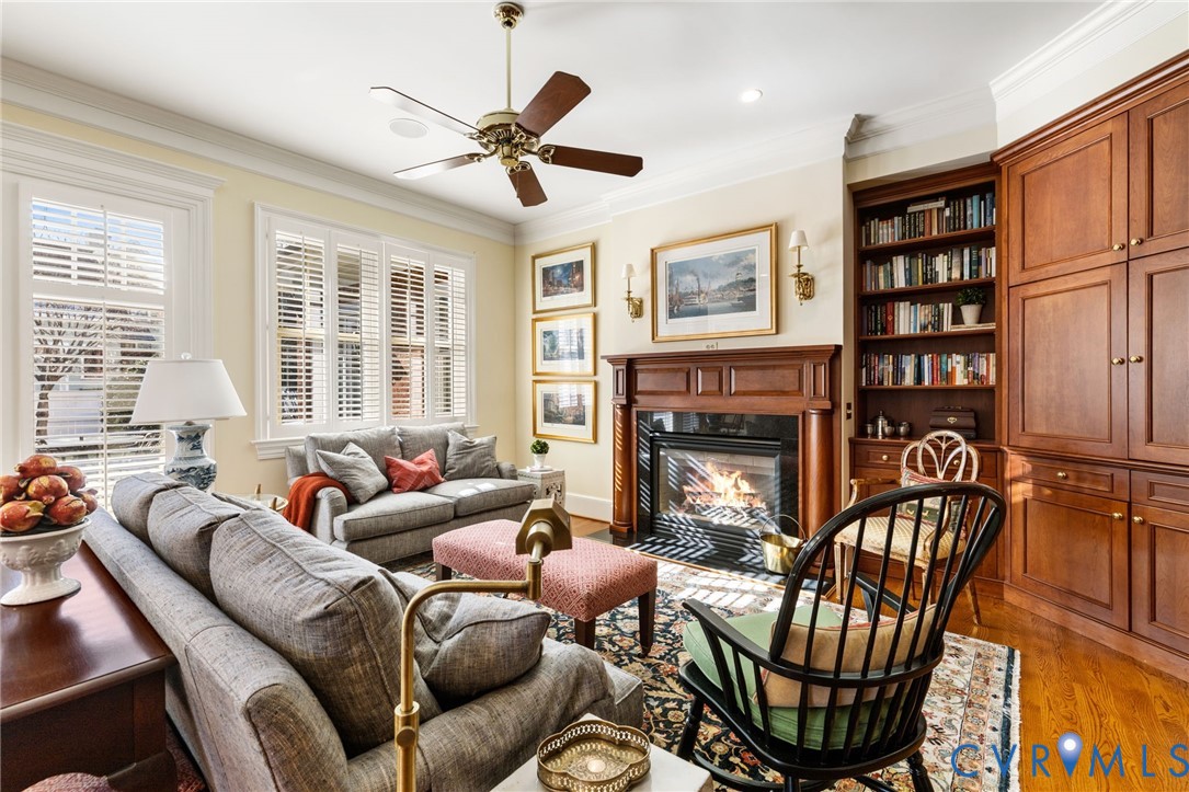 2730 Live Oak Lane Midlothian, VA 23113 - Photo 23 of 31 Custom built ins, gas fireplace and plantation shu