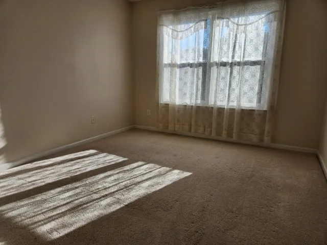 a view of a room with a window