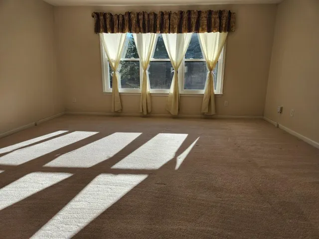 an empty room with windows