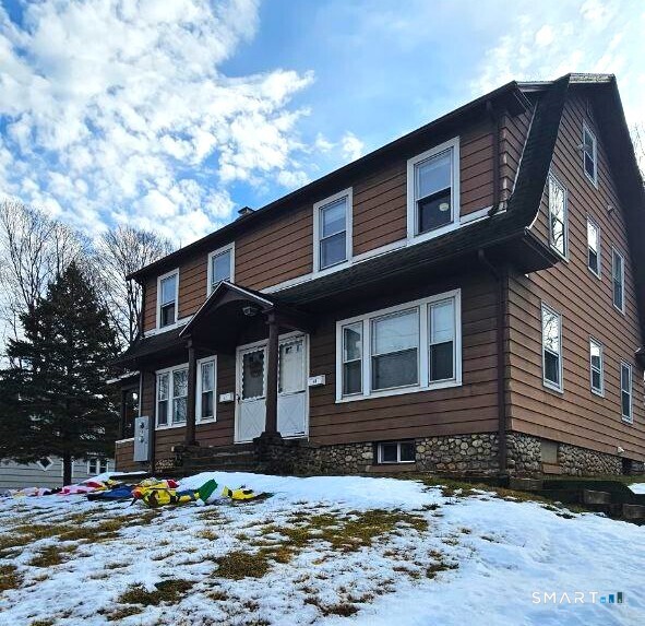 49 Bingham Street Bristol, CT 06010 - Photo 1 of 27 a front view of a house with a yard