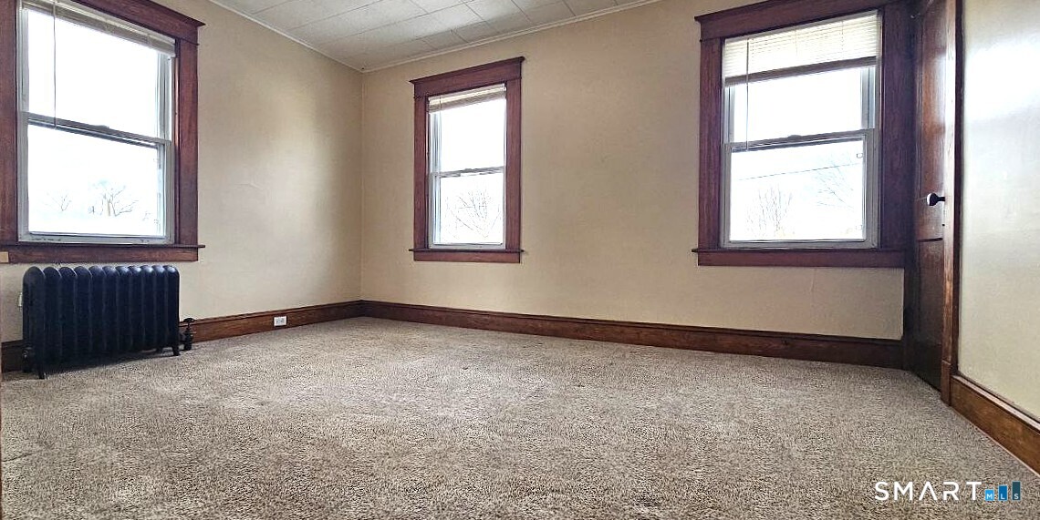 49 Bingham Street Bristol, CT 06010 - Photo 18 of 27 an empty room with a window