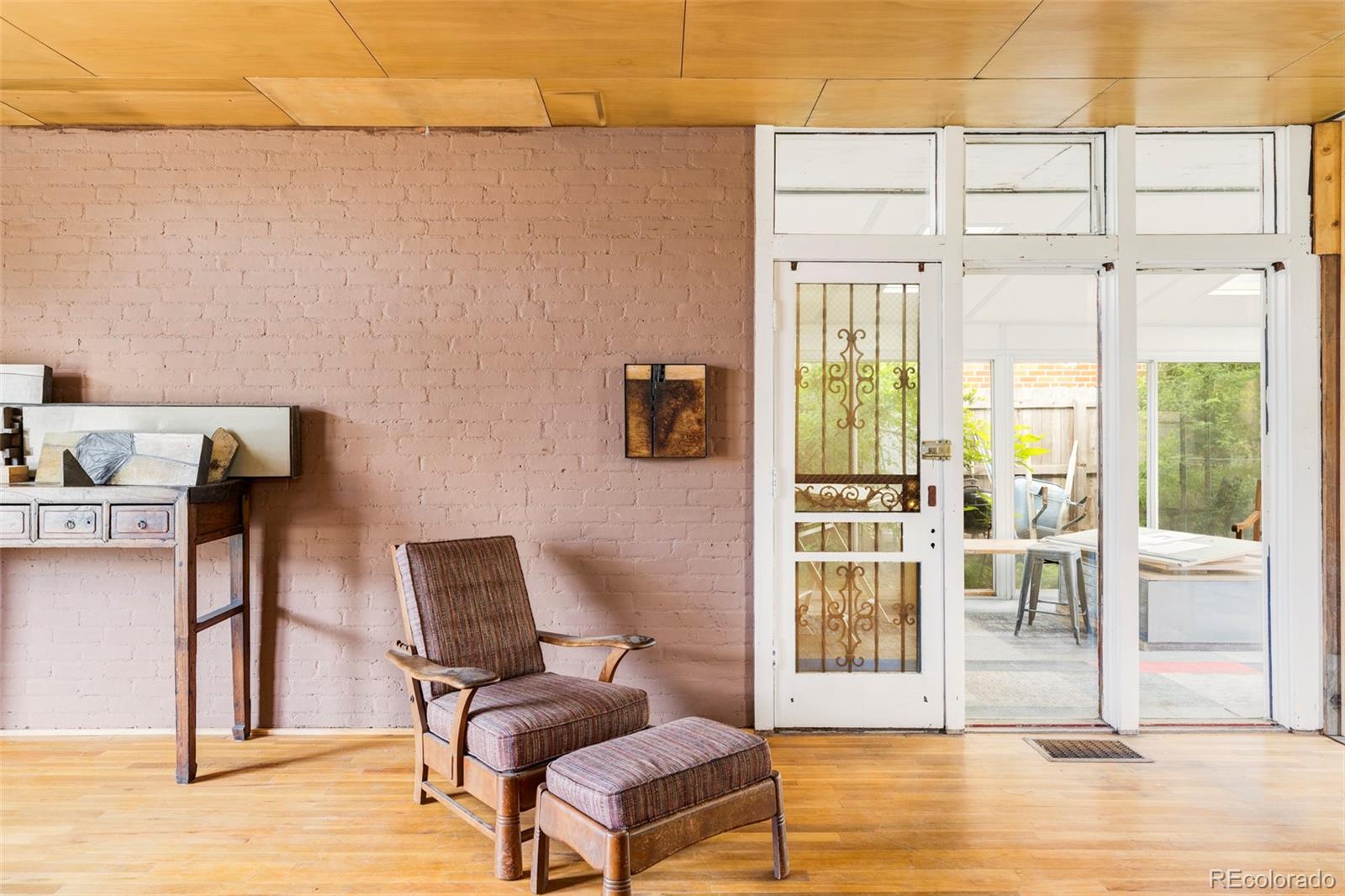 3025 Glencoe Street Denver, CO 80207 - Photo 4 of 26 a living room with furniture