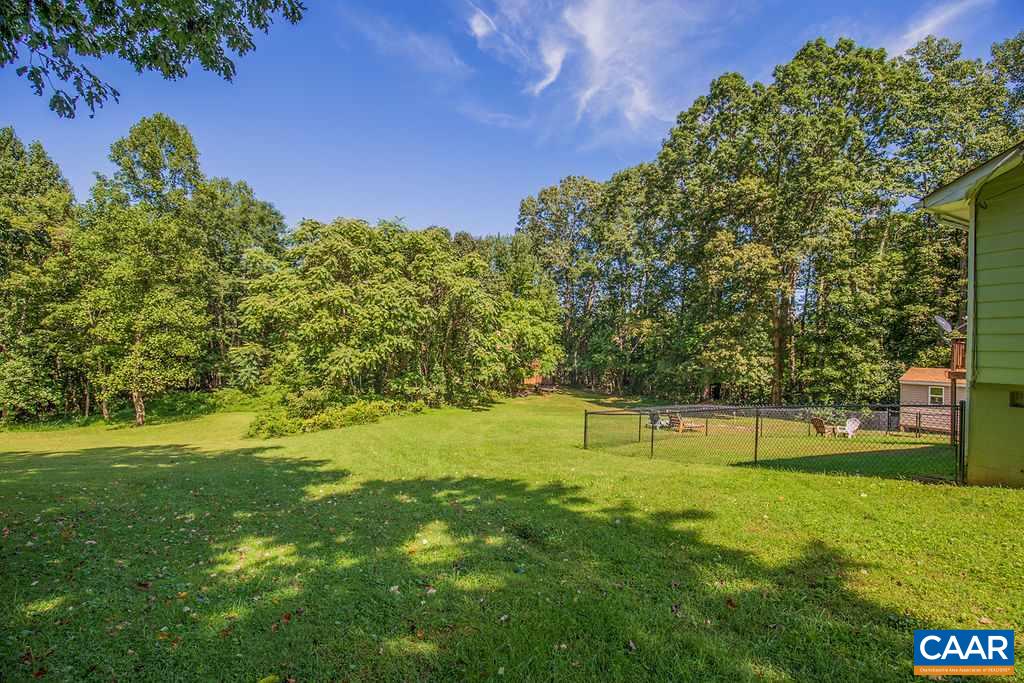 7219 Amicus Road Ruckersville, VA 22968 - Photo 4 of 35 a view of green field with trees in the background