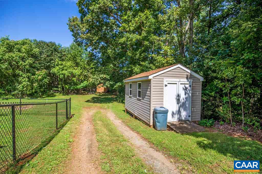 7219 Amicus Road Ruckersville, VA 22968 - Photo 8 of 35 a view of a house with backyard