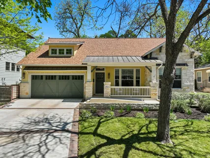 a house with trees in front of it