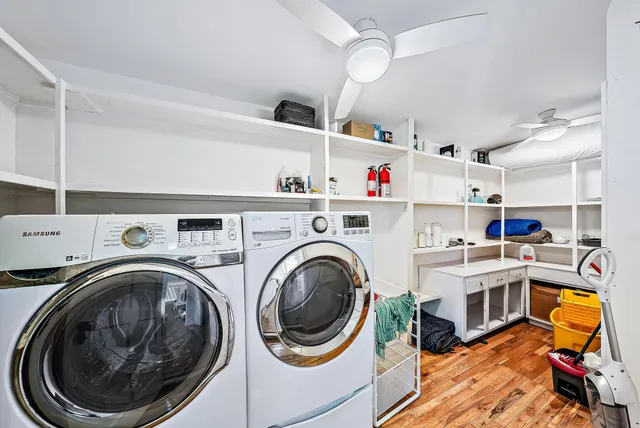 a view of a kitchen with washer and dryer