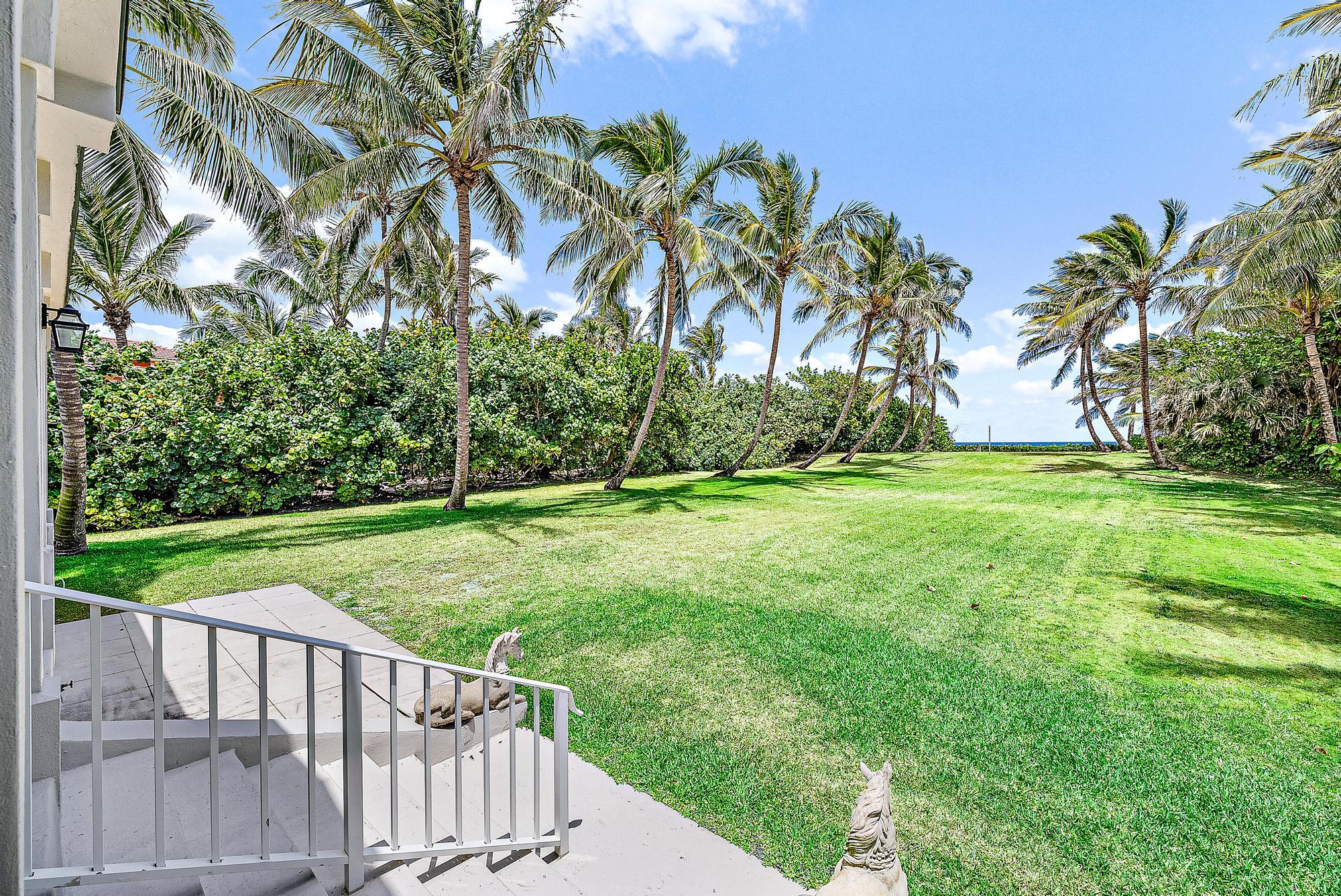 5 North Beach Road Jupiter Island, FL 33455 - Photo 29 of 33 a view of a porch with a yard