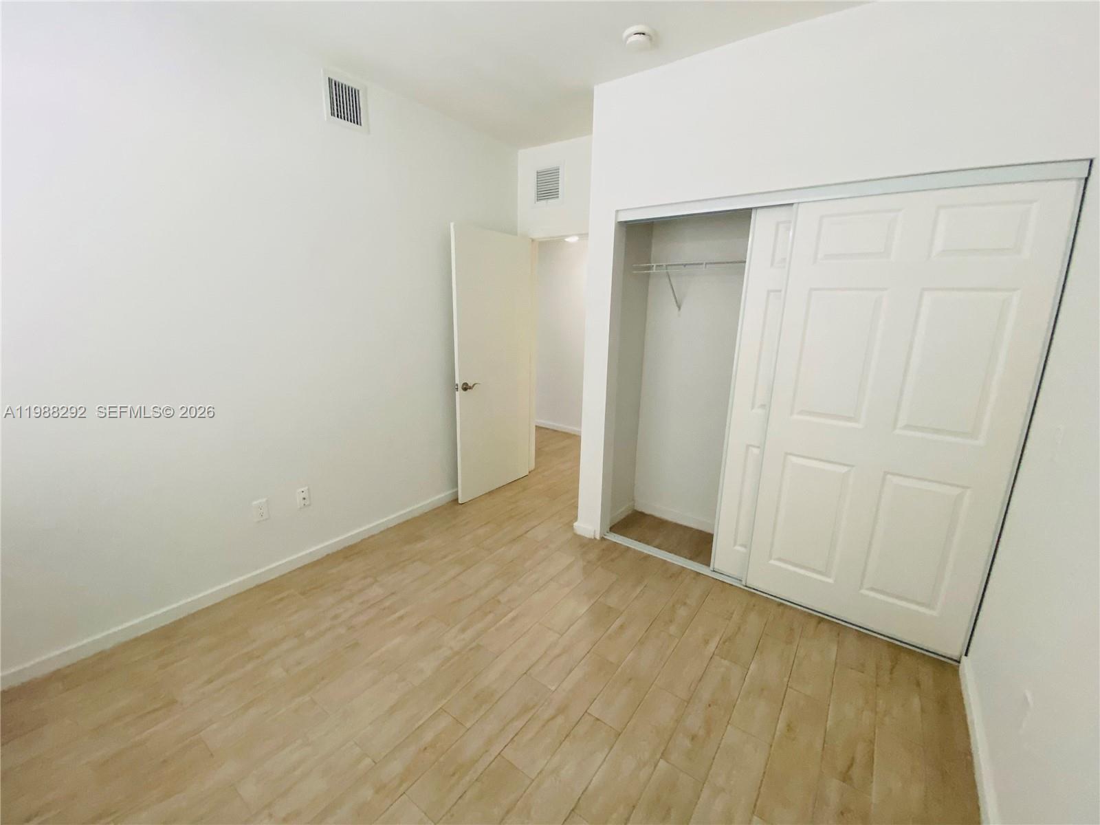1611 Meridian Avenue, Unit 305 Miami Beach, FL 33139 - Photo 12 of 17 a view of an empty room