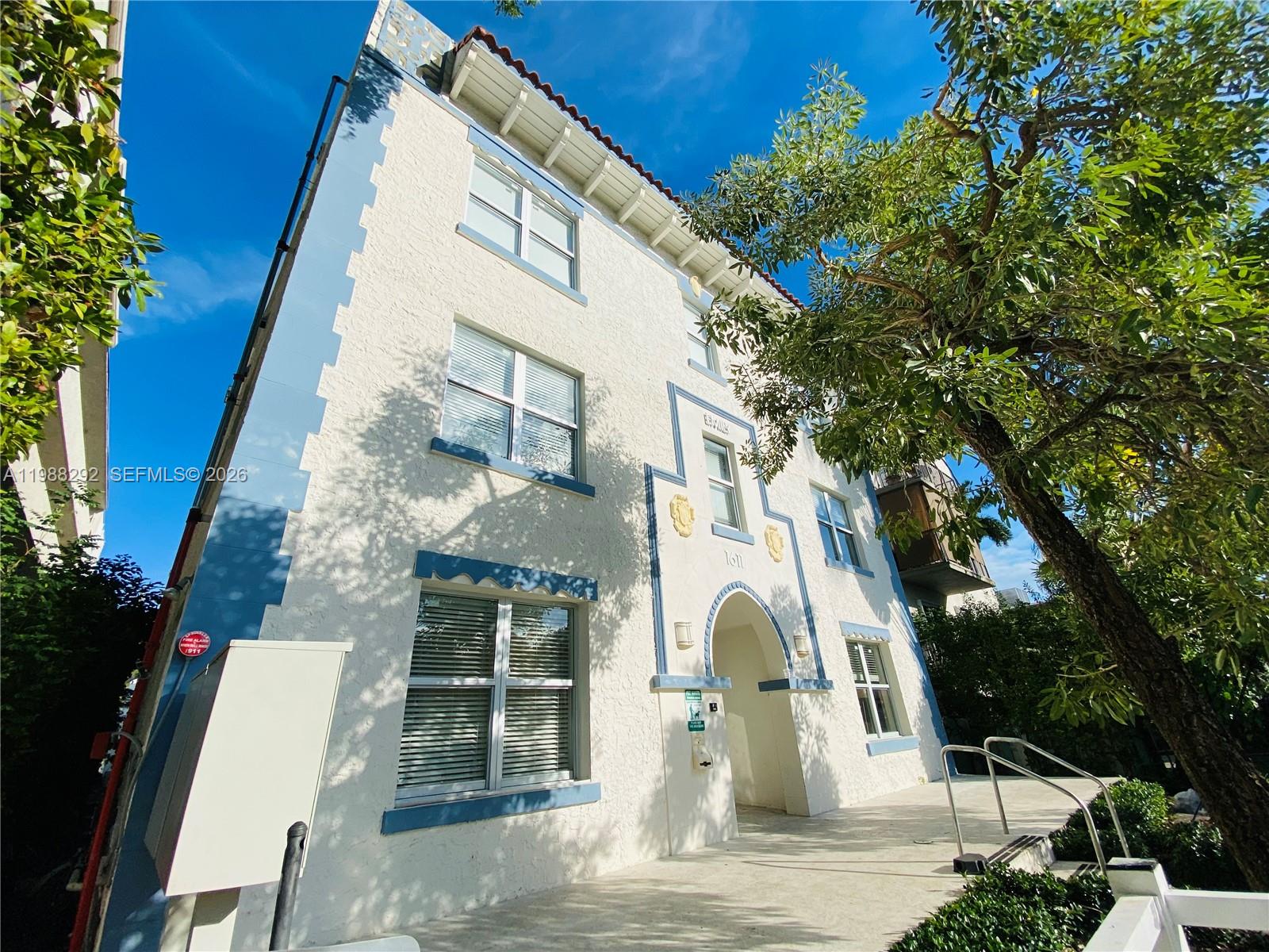 1611 Meridian Avenue, Unit 305 Miami Beach, FL 33139 - Photo 17 of 17 a view of a white building among the street