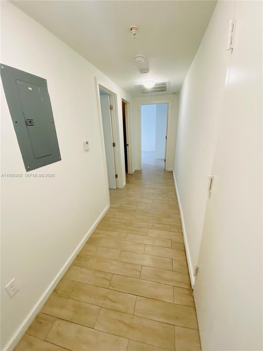 1611 Meridian Avenue, Unit 305 Miami Beach, FL 33139 - Photo 7 of 17 a view of a hallway
