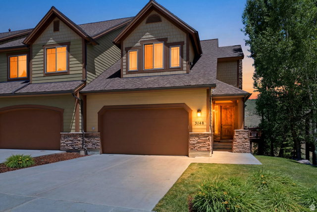 3148 Lower Saddleback Road Park City, UT 84098 - Photo 2 of 67 Exterior featuring multi-toned siding, a prominent two-car garage, and stone accents