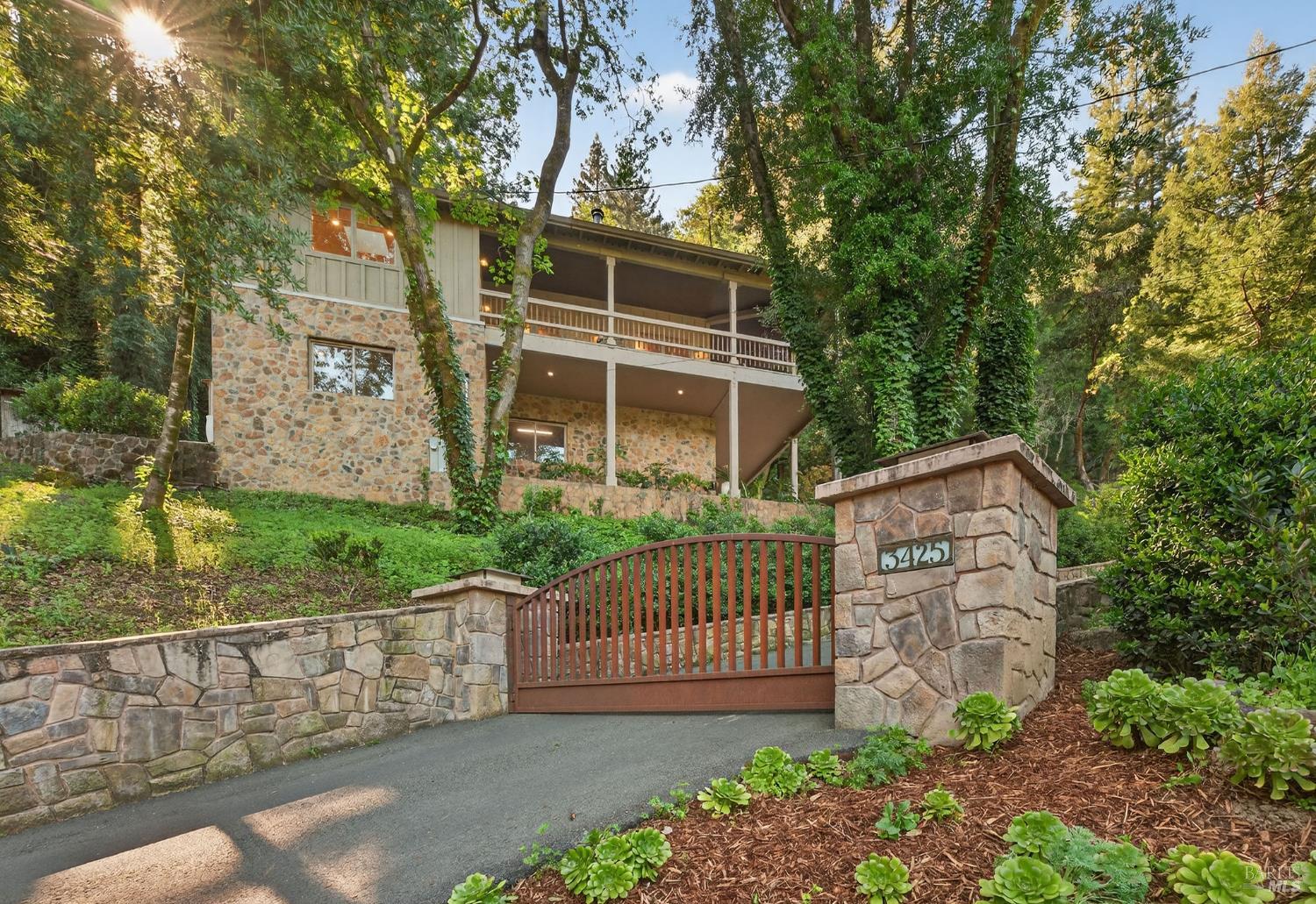 front view of a house with a garden