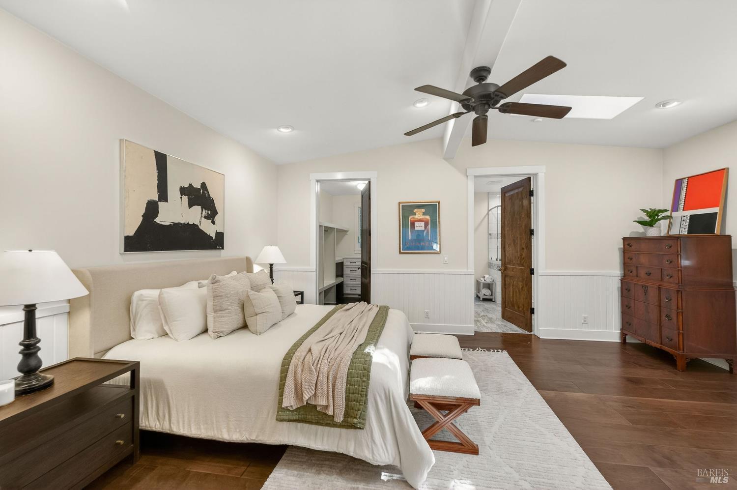 3425 Redwood Road Napa, CA 94558 - Photo 18 of 38 a bedroom with a bed and a chandelier