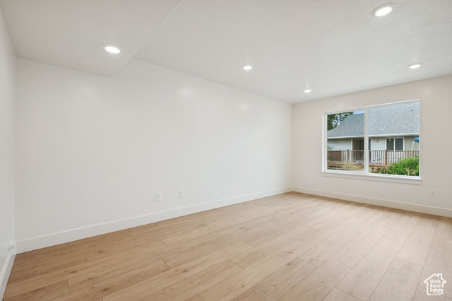 1615 North Angel Street, Unit E Layton, UT 84041 - Photo 30 of 42 Spare room with light wood-style flooring and recessed lighting