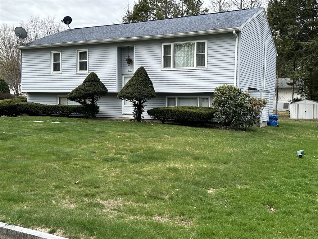 18 Crystal Brook Drive Springfield, MA 01118 - Photo 2 of 20 a view of a house with backyard and sitting area